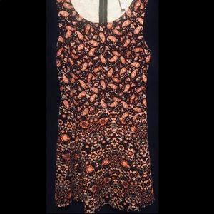 Never worn. Women's floral sleeveless mini dress